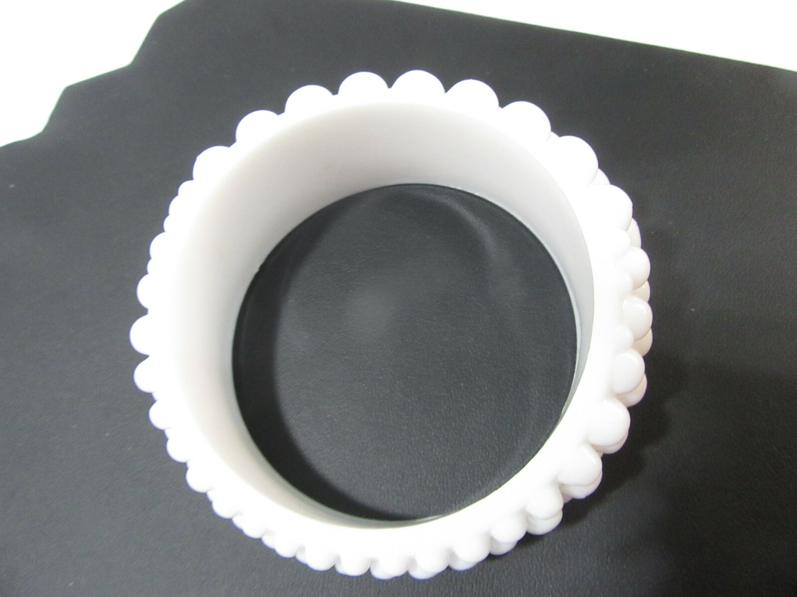 VERY LARGE WHITE ‘BEADED’ BANGLE BRACELET ODD MORPHED HIGHER ON ONE SIDE
