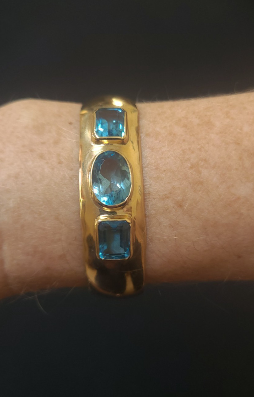Gorgeous Blue Topaz Cuff Bracelet set in 14K Solid Yellow Gold – Kabana Stamp