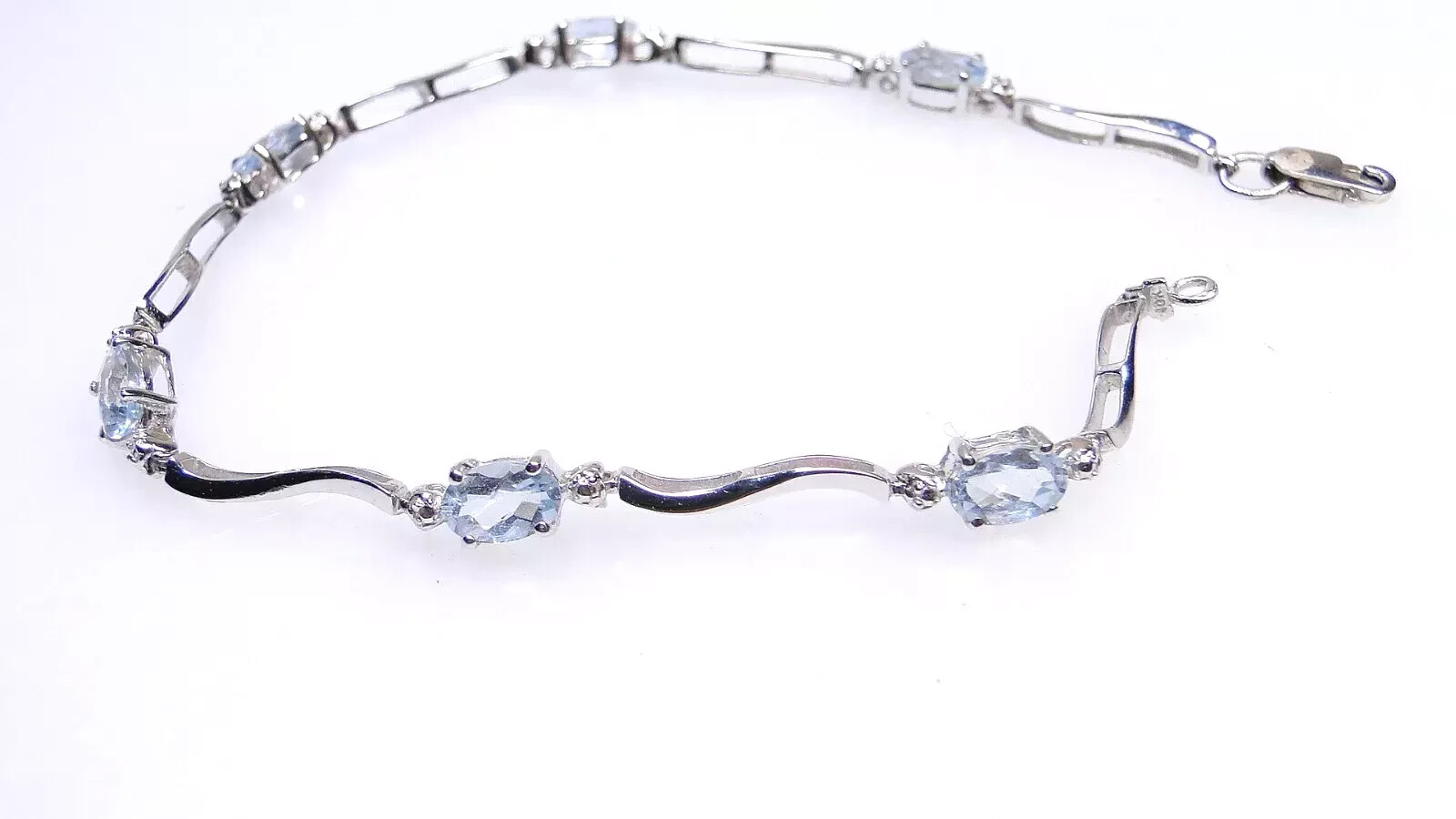 Elegant 10K White Gold Aquamarine Tennis Bracelet w Fancy Links