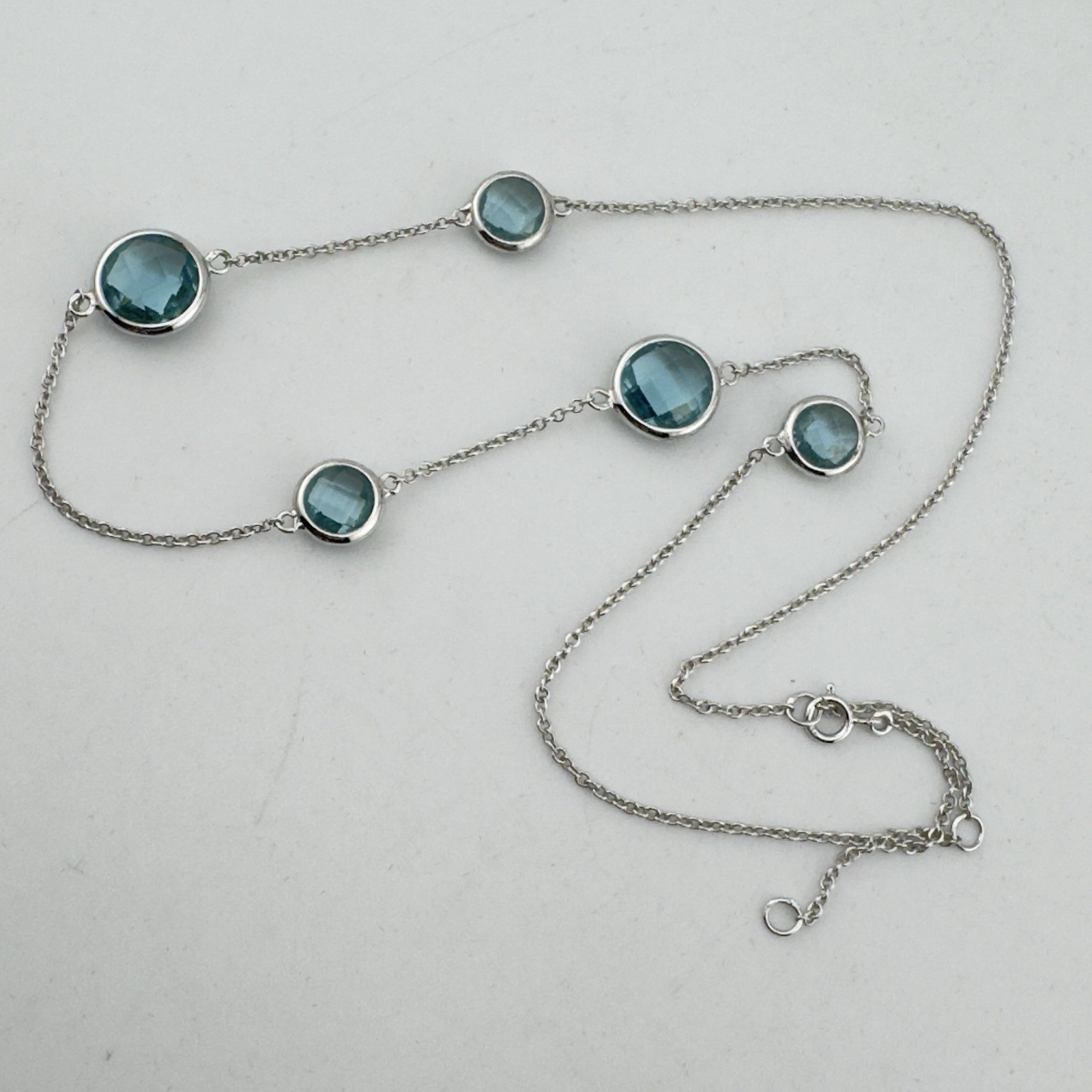 Sterling Sterling asymmetrical Open Back Blue Crystal Station Necklace Rhodium