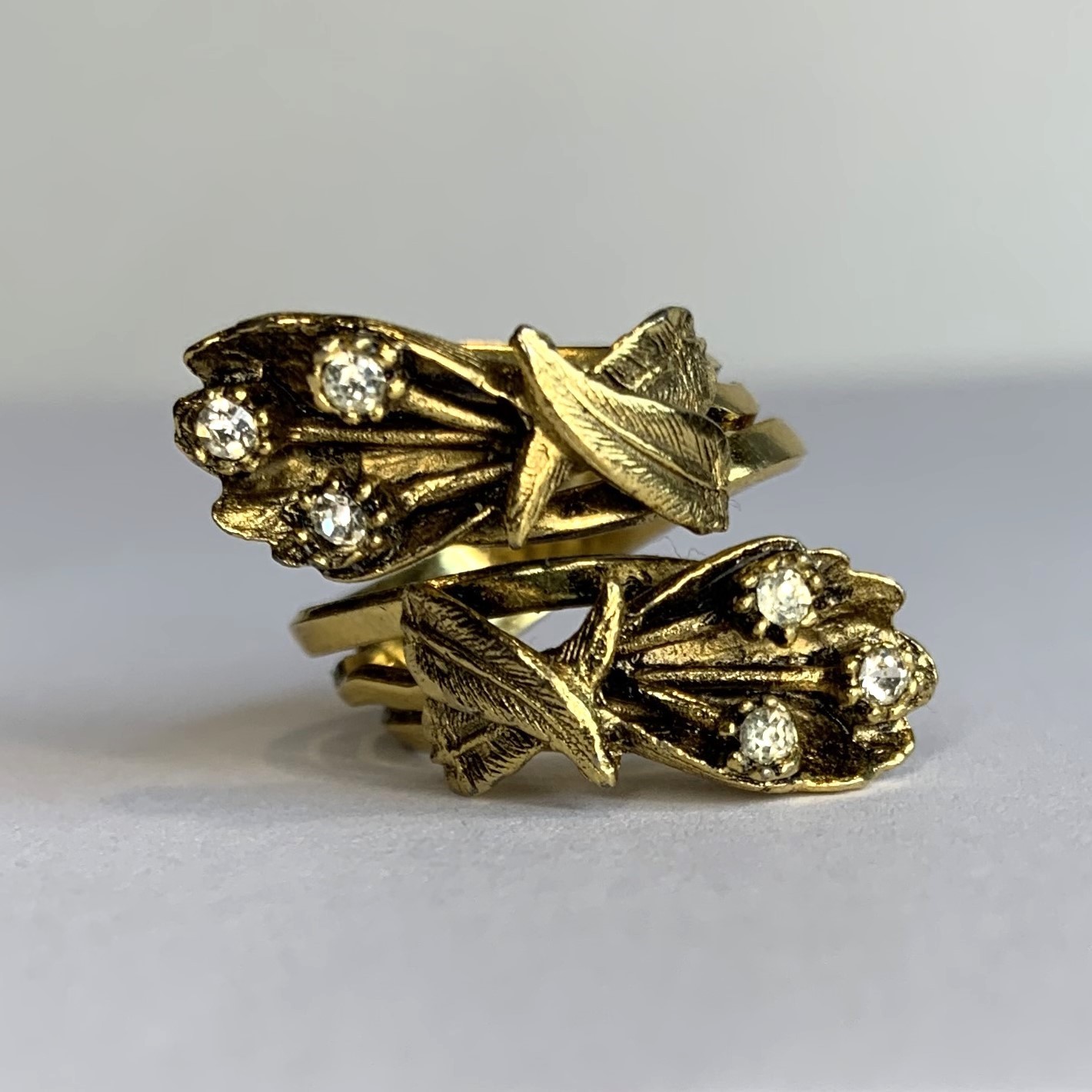 Vintage Gold Tone Leaves Clear Rhinestone Bypass Cocktail Ring Size 6.25