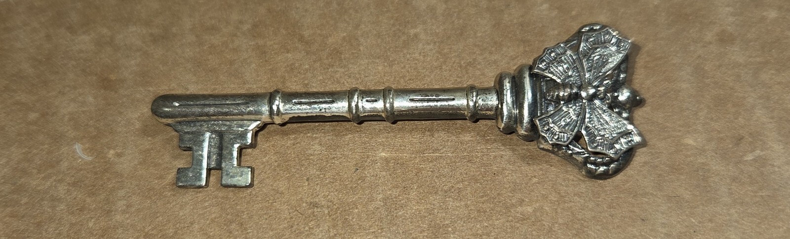 Pin Skeleton Key with Butterfly on Top Sterling 2 3/8″