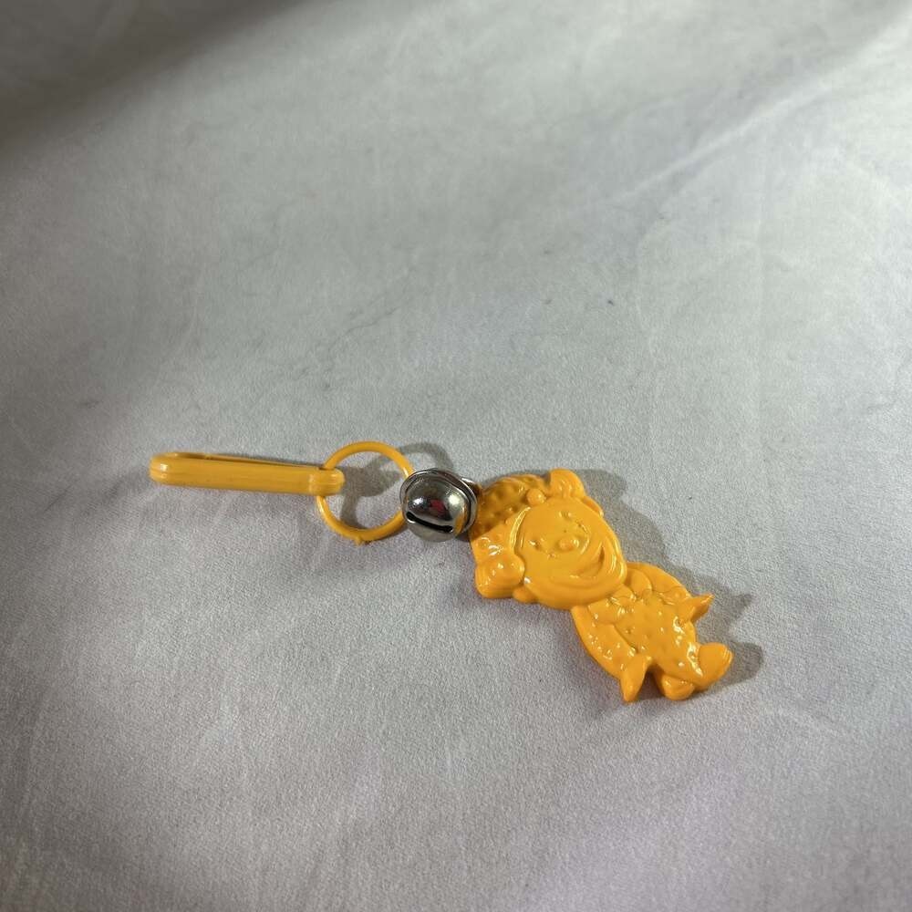 Vtg 80’s Plastic orange boy Clip On Charm with Bell For Charms Necklace